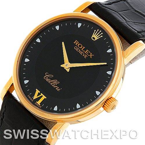 This image shows a close-up of the Rolex Cellini 5115 Men's Yellow Gold Black Dial 5115 Men's Yellow Gold Black Dial watch, highlighting its black dial, gold casing, and leather strap.
