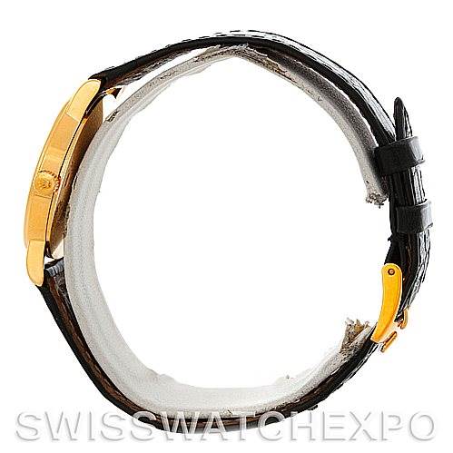 The image shows a side view of the Rolex Cellini 5115 Men's Yellow Gold Black Dial 5115 Men's Yellow Gold Black Dial watch, highlighting the watch case and leather strap.