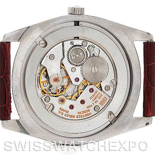 This image shows the back view of a Rolex Cellini 4233 Men's White Gold White Dial 4233 Men's White Gold White Dial watch, focusing on its internal mechanical movement.