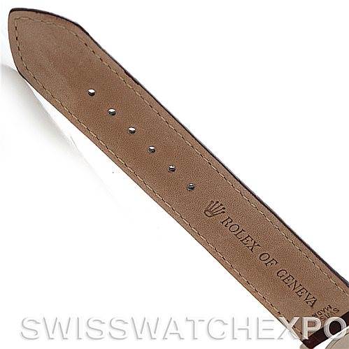 The image shows a close-up of a leather strap for a Rolex Cellini 4233 Men's White Gold White Dial 4233 Men's White Gold White Dial watch, featuring the brand's logo and name.