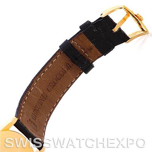 The image shows a close-up view of the leather strap and gold buckle of a Rolex Cellini 5116 Men's Yellow Gold Black Dial 5116 Men's Yellow Gold Black Dial watch.