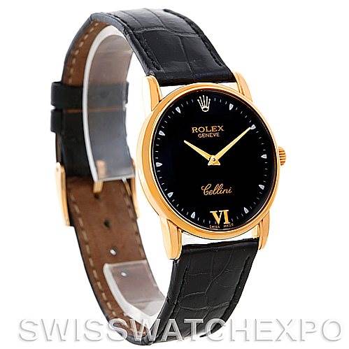 The Rolex Cellini 5116 Men's Yellow Gold Black Dial 5116 Men's Yellow Gold Black Dial watch is shown at an angled side view, displaying its face, black leather strap, and gold accents.