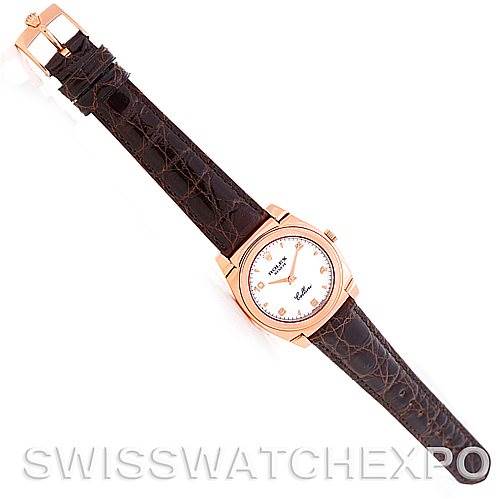 The Rolex Cellini 5320/5 Rose Gold White Dial 5320/5 Rose Gold White Dial watch is shown from an overhead angle, displaying the face, dial, and leather strap.