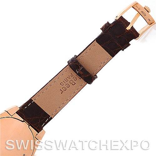 This image shows the back view of a Rolex Cellini 5320/5 Rose Gold White Dial 5320/5 Rose Gold White Dial watch, highlighting its leather strap and buckle.