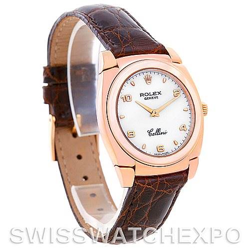 This image shows a side-angle view of a Rolex Cellini 5320/5 Rose Gold White Dial 5320/5 Rose Gold White Dial watch, highlighting the watch face, leather strap, and gold casing.