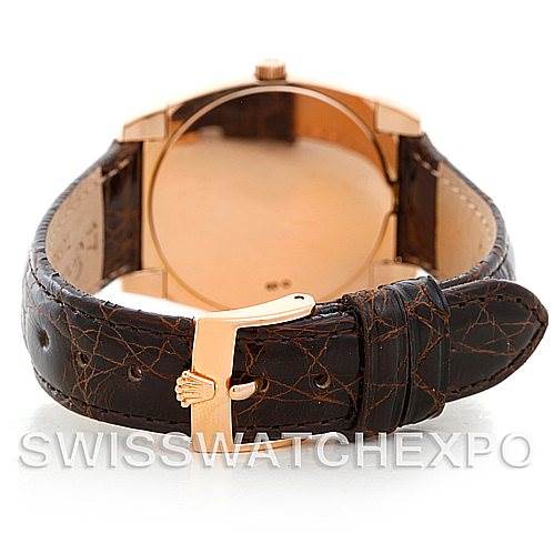 This image shows the back view of the Rolex Cellini 5320/5 Rose Gold White Dial 5320/5 Rose Gold White Dial watch, highlighting its leather strap and clasp.