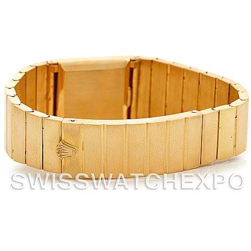 This image shows the gold bracelet of a Rolex Cellini 4017 Men's Yellow Gold Champagne Dial 4017 Men's Yellow Gold Champagne Dial watch from a top view, highlighting the clasp and links.