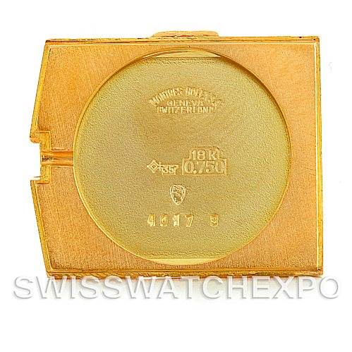 This is an image of an 18K gold Rolex Cellini 4017 Men's Yellow Gold Champagne Dial 4017 Men's Yellow Gold Champagne Dial watch's case back viewed from above.