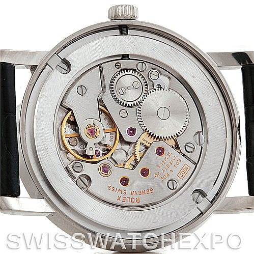 This image shows the movement and inner workings of the Rolex Cellini 5115 Men's White Gold Silver Dial 5115 Men's White Gold Silver Dial watch from the back, highlighting the intricate gears and components.