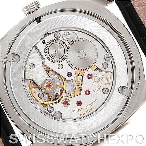 This image shows the back of a Rolex Cellini 4233 Men's White Gold White Dial 4233 Men's White Gold White Dial watch, highlighting its intricate movement and internal mechanisms.
