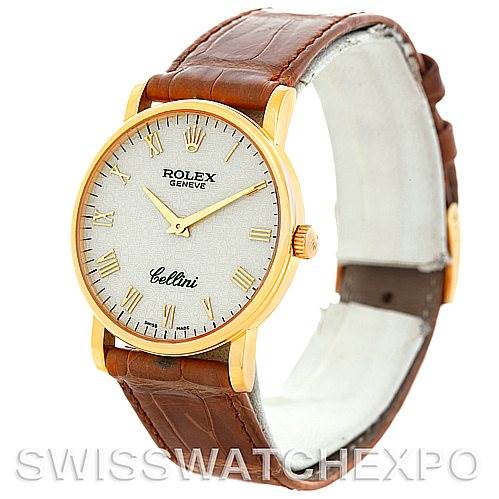 This image shows a Rolex Cellini 5115 Men's Yellow Gold Beige Dial 5115 Men's Yellow Gold Beige Dial watch from a front angle, highlighting its dial, case, crown, and leather strap.