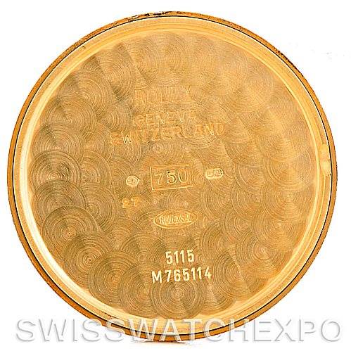 The image shows the inside of the back cover of a Rolex Cellini 5115 Men's Yellow Gold Beige Dial 5115 Men's Yellow Gold Beige Dial watch, displaying various markings and engravings.