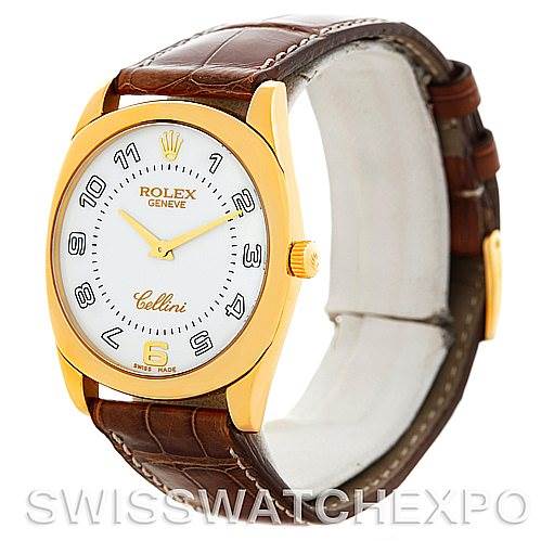 This image shows a Rolex Cellini 4233 Men's Yellow Gold White Dial 4233 Men's Yellow Gold White Dial watch at an angled side view, highlighting its gold case, white dial, and brown leather strap.