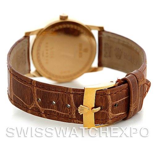 The image shows the back and strap of a Rolex Cellini 5116 Men's Yellow Gold Mother of Pearl Dial 5116 Men's Yellow Gold Mother of Pearl Dial watch, highlighting the leather strap and gold buckle.