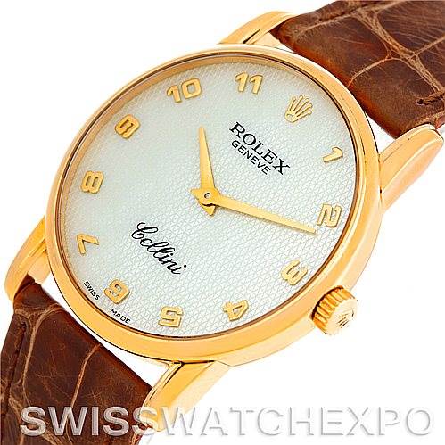 The image shows a Rolex Cellini 5116 Men's Yellow Gold Mother of Pearl Dial 5116 Men's Yellow Gold Mother of Pearl Dial watch at an angle highlighting the face, gold case, and brown leather strap.
