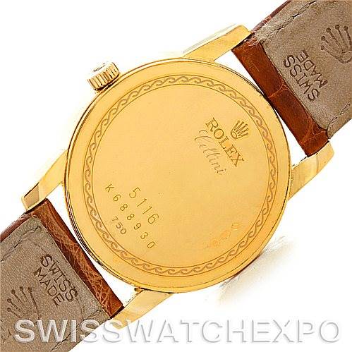 This image shows the back of a Rolex Cellini 5116 Men's Yellow Gold Mother of Pearl Dial 5116 Men's Yellow Gold Mother of Pearl Dial model watch with a gold case and brown leather straps.