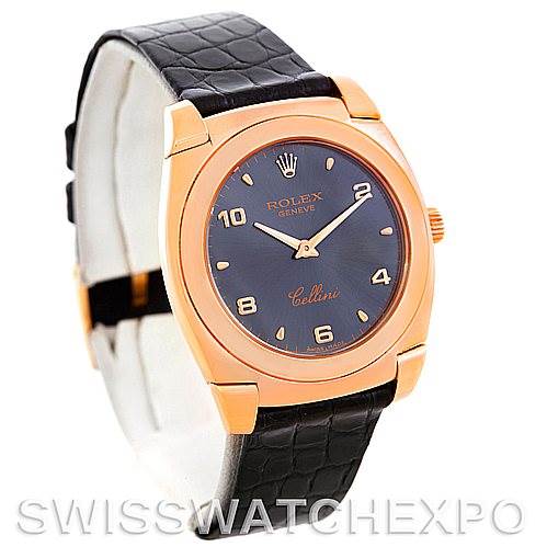 The Rolex Cellini 5320/5 Rose Gold Grey Dial 5320/5 Rose Gold Grey Dial watch is shown at a slightly angled view, highlighting its gold case, black dial, and black leather strap.