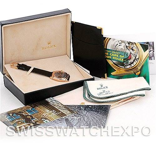 The image shows a Rolex Cellini 5320/5 Rose Gold Grey Dial 5320/5 Rose Gold Grey Dial watch at an angle inside its open box, along with accompanying accessories and documentation.