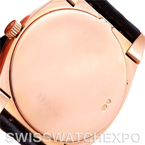 This image shows the back case and part of the strap of a Rolex Cellini 5320/5 Rose Gold Grey Dial 5320/5 Rose Gold Grey Dial watch from a close-up angle.