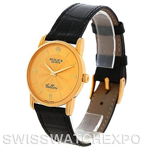 The image shows a Rolex Cellini 5116 Men's Yellow Gold Champagne Dial 5116 Men's Yellow Gold Champagne Dial watch at a slight angle, displaying the gold case, dial, crown, and black leather strap.