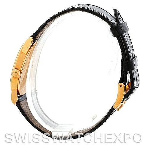 The image shows a side profile of the Rolex Cellini 5116 Men's Yellow Gold Champagne Dial 5116 Men's Yellow Gold Champagne Dial watch, highlighting the gold case and black leather strap.