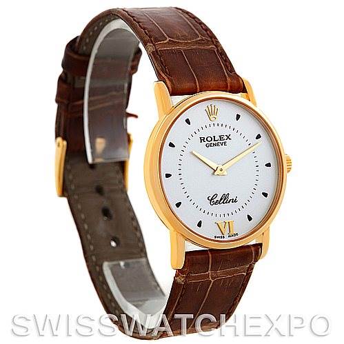 This image shows a Rolex Cellini 5115 Men's Yellow Gold Silver Dial 5115 Men's Yellow Gold Silver Dial watch angled to display the face, bezel, crown, and brown leather strap.