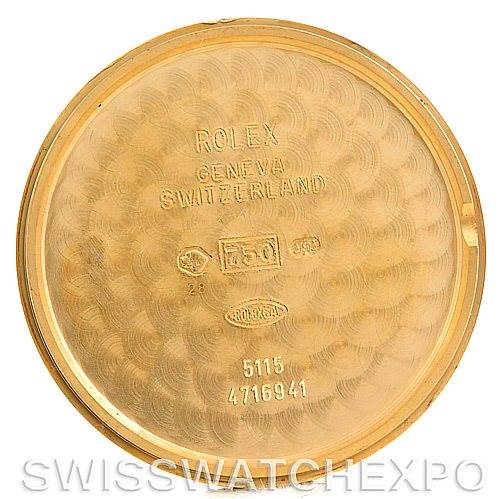 The image shows the interior back case of a Rolex Cellini 5115 Men's Yellow Gold Silver Dial 5115 Men's Yellow Gold Silver Dial watch, displaying hallmark and serial numbers.