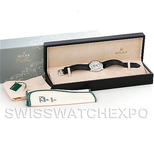 The image shows a Rolex Cellini 5240 Men's Platinum Mother of Pearl Dial 5240 Men's Platinum Mother of Pearl Dial watch in its open box, along with a Rolex-branded pouch and a green tag.