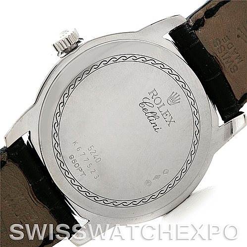 The image shows the back case and leather strap of a Rolex Cellini 5240 Men's Platinum Mother of Pearl Dial 5240 Men's Platinum Mother of Pearl Dial watch, featuring engraved details and brand markings.