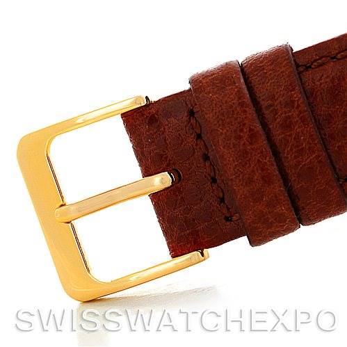 This image shows a close-up of a brown leather strap with a gold buckle, part of a Rolex Cellini 3804 Men's Yellow Gold Champagne Dial 3804 Men's Yellow Gold Champagne Dial model watch.