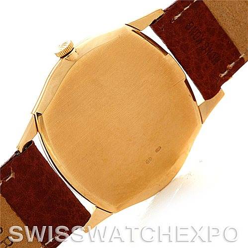 This image shows the back view of a Rolex Cellini 3804 Men's Yellow Gold Champagne Dial 3804 Men's Yellow Gold Champagne Dial watch, focusing on the case back and part of the leather strap.