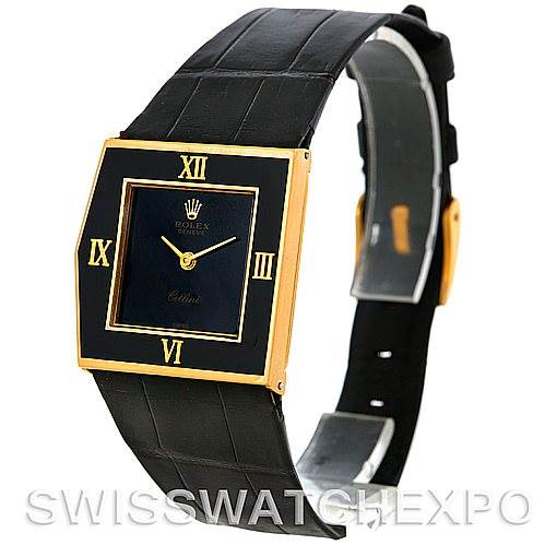 The image shows an angled view of a Rolex Cellini Men's Yellow Gold Black Dial Men's Yellow Gold Black Dial watch, displaying the black leather strap and gold square face with Roman numerals.
