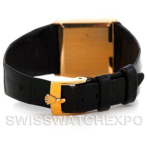 This image shows the back of a Rolex Cellini Men's Yellow Gold Black Dial Men's Yellow Gold Black Dial watch, highlighting the black leather strap and the gold clasp.