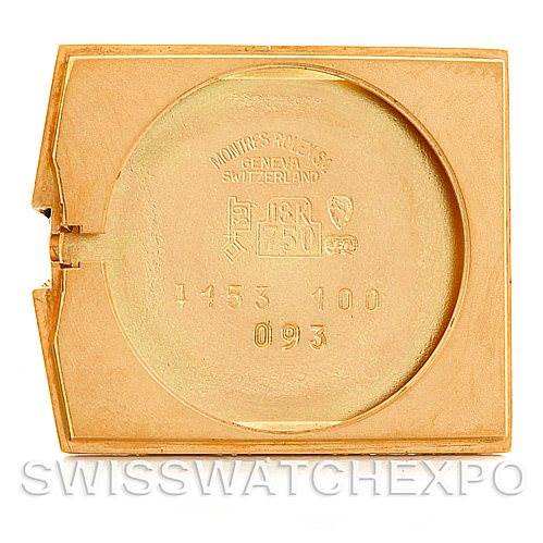 This image shows the inside case back of a Rolex Cellini Men's Yellow Gold Black Dial Men's Yellow Gold Black Dial model watch, with inscriptions and a gold finish.