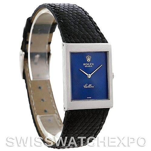 This image shows a Rolex Cellini 4014 Men
s White Gold Blue Dial 4014 Men
s White Gold Blue Dial watch from a front angle, highlighting its rectangular face, blue dial, and black leather strap.
