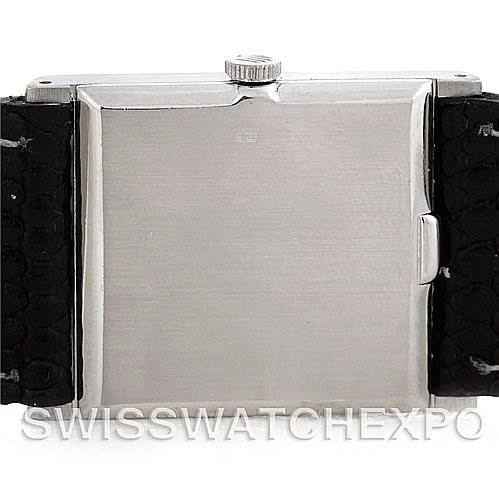 The image shows the back case and black leather straps of a Rolex Cellini 4014 Men
s White Gold Blue Dial 4014 Men
s White Gold Blue Dial model watch.