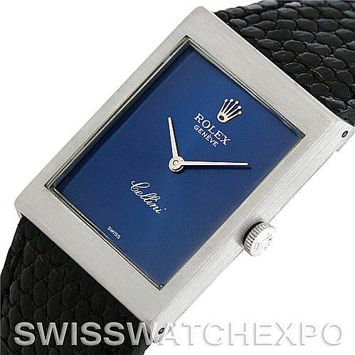 This image shows a Rolex Cellini 4014 Men
s White Gold Blue Dial 4014 Men
s White Gold Blue Dial watch from a slightly angled top view, displaying the face, crown, and a portion of the strap.