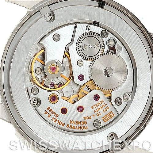This is an image showing the back view of the Rolex Cellini 5116 Men's White Gold Silver Dial 5116 Men's White Gold Silver Dial watch, focusing on the internal mechanical movement.