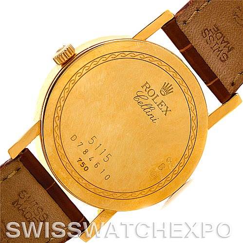 The image shows the back of the Rolex Cellini 5115 Men's Yellow Gold Silver Dial 5115 Men's Yellow Gold Silver Dial watch, highlighting the case back and leather straps with the brand and model name visible.