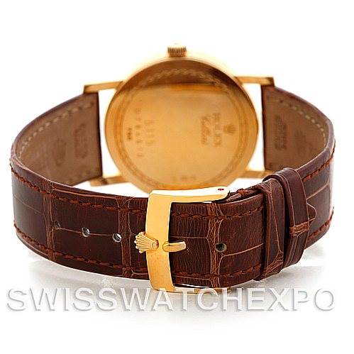 This image shows the back view of a Rolex Cellini 5115 Men's Yellow Gold Silver Dial 5115 Men's Yellow Gold Silver Dial watch, highlighting the leather strap and gold-tone buckle.