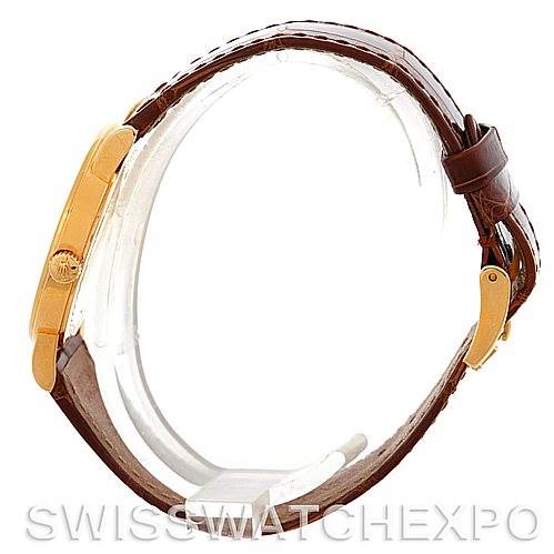 The image shows the Rolex Cellini 5115 Men's Yellow Gold Silver Dial 5115 Men's Yellow Gold Silver Dial watch from a side profile angle, highlighting its gold case and brown leather strap.