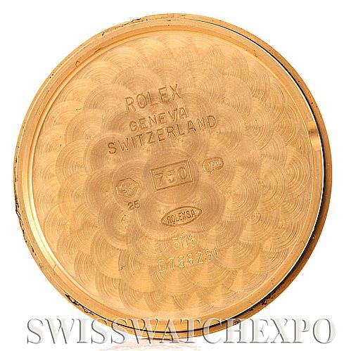 The image shows the inside of the case back of a Rolex Cellini 5116 Men
s Yellow Gold Champagne Dial 5116 Men
s Yellow Gold Champagne Dial watch, displaying engravings and hallmarks.