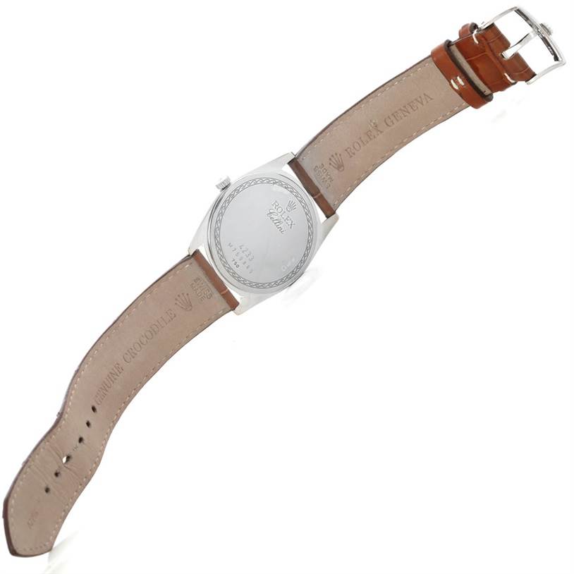 The image shows the back side of a Rolex Cellini 4233 Men's White Gold White Dial 4233 Men's White Gold White Dial watch with a leather strap fully extended.