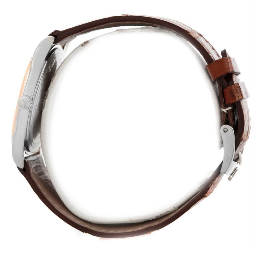 The image shows a side view of the Rolex Cellini 4233 Men's White Gold White Dial 4233 Men's White Gold White Dial watch, highlighting the crown, case, and leather strap with buckle.