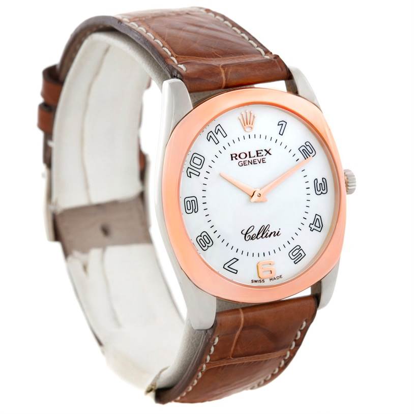 This angled view of the Rolex Cellini 4233 Men's White Gold White Dial 4233 Men's White Gold White Dial watch shows the dial, bezel, case, and brown leather strap.