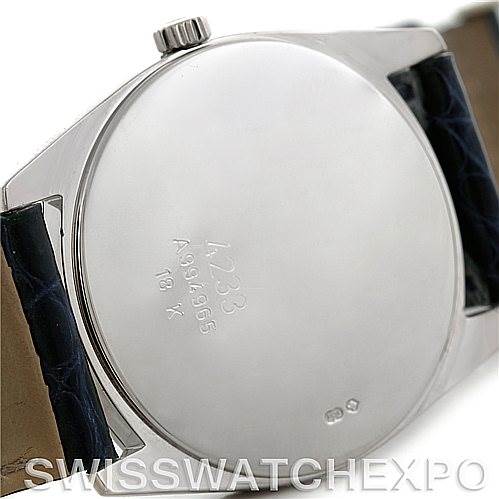 The image shows the back case and crown of a Rolex Cellini 4233 Men's White Gold White Dial 4233 Men's White Gold White Dial watch, displaying its engravings.