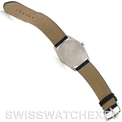 This image shows the back view of a Rolex Cellini 4233 Men's White Gold White Dial 4233 Men's White Gold White Dial watch, highlighting its leather strap and clasp.