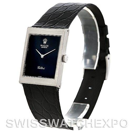 The image shows a side angle of a Rolex Cellini 4014 Men's White Gold Black Dial 4014 Men's White Gold Black Dial watch, highlighting its rectangular face, black leather strap, and crown.