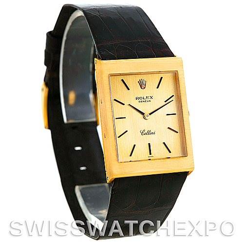 This image shows a Rolex Cellini 4027 Men's Yellow Gold Champagne Dial 4027 Men's Yellow Gold Champagne Dial watch angled slightly from the side, featuring a rectangular gold face and a black leather strap.