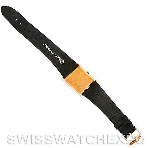 The image shows the back view of a Rolex Cellini 4027 Men's Yellow Gold Champagne Dial 4027 Men's Yellow Gold Champagne Dial watch, highlighting its leather strap and gold case.